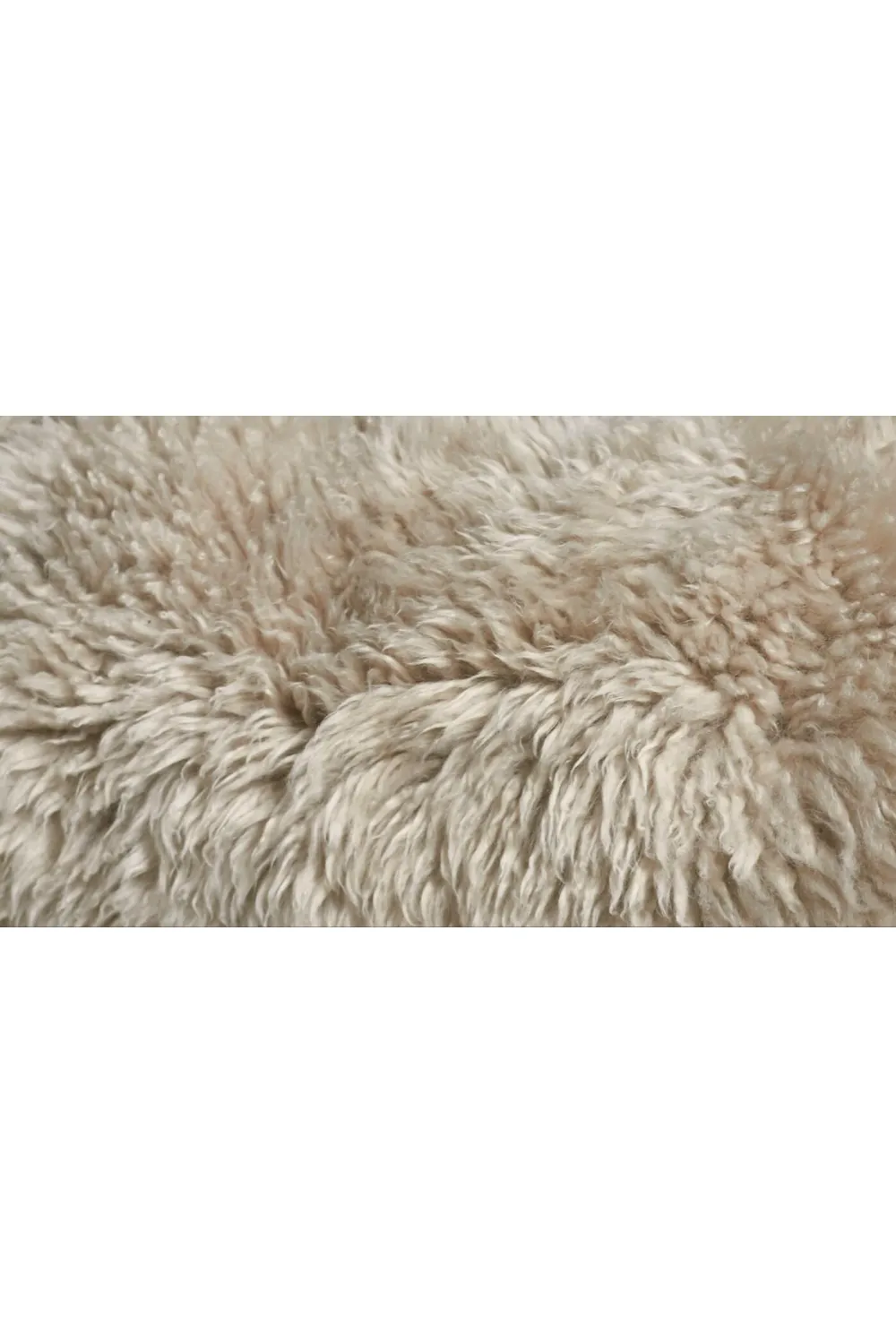 Beige Sheepskin Lounge Armchair | Andrew Martin Manx